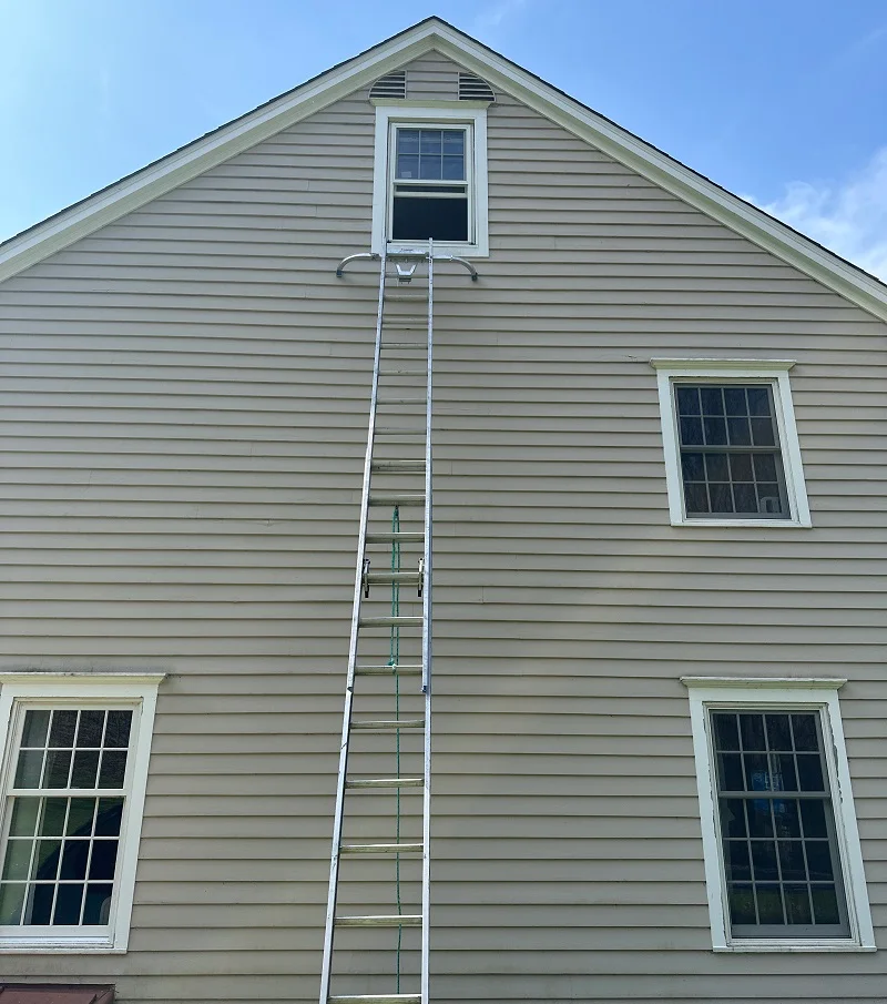 Using a tall ladder to replace this trid floor double hung window